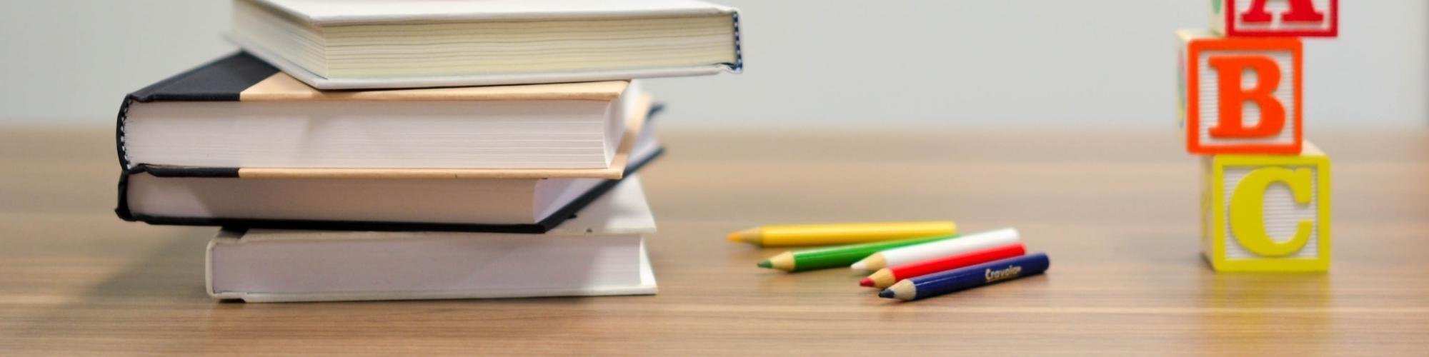 books on a desk in Winchester, KY